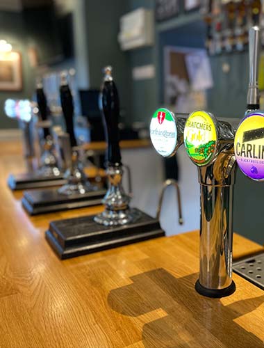 The beer pumps at Y Griffin